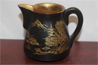 A Japanese Lacquer Creamer