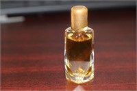 A Vintage Emeraude 1/2oz Parfume Bottle