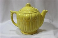 A Vintage Yellow Shawnee Teapot