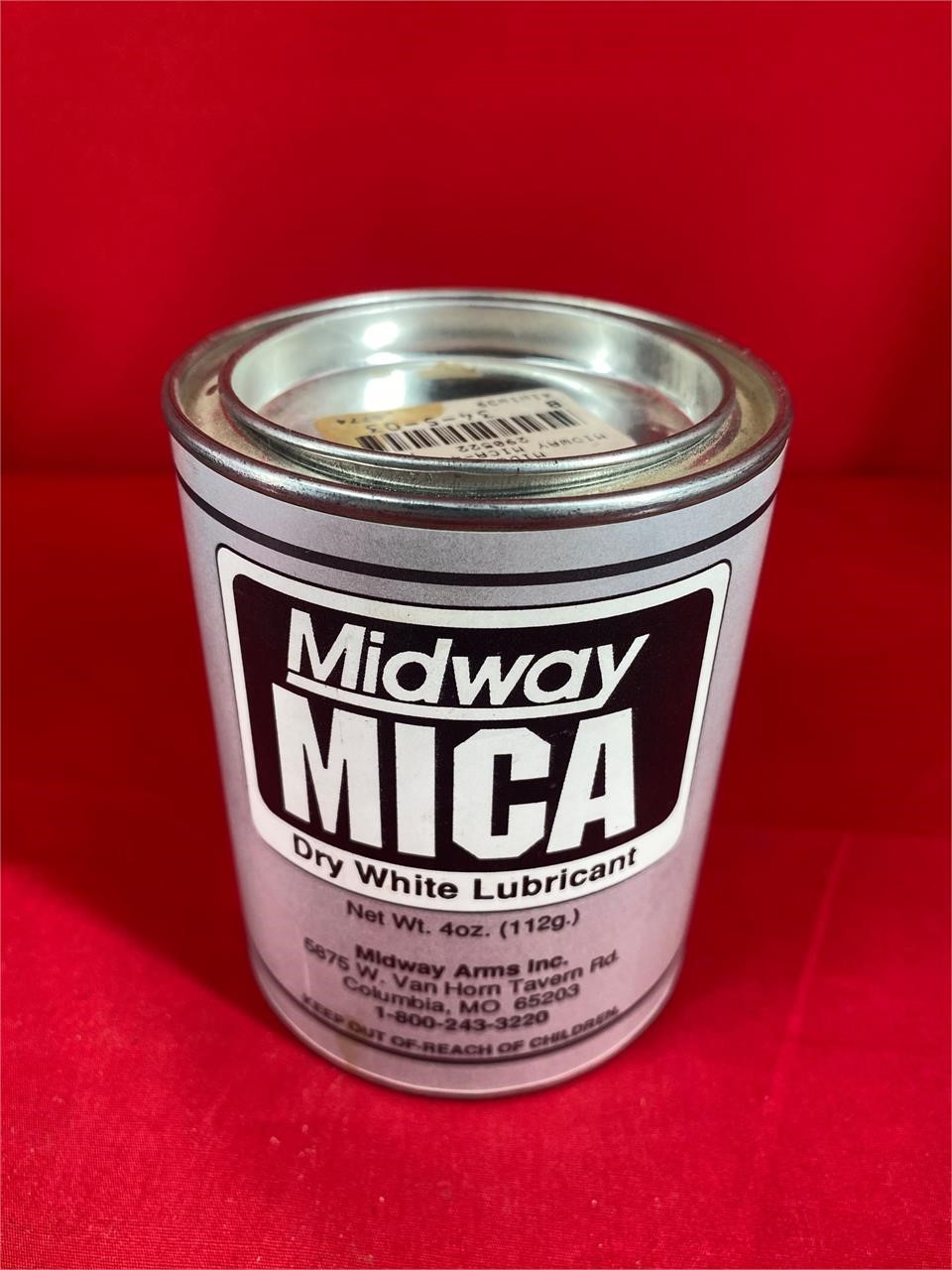 Opened can of Midway MICA Dry white lubricant