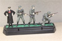 Metal Toy Soldiers on Plastic Stand
