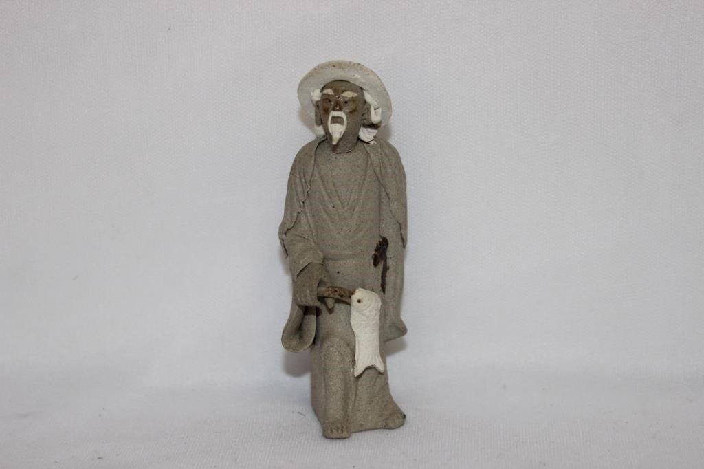 A Chinese Mud Figurine