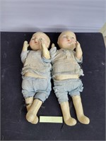 pair of old dolls