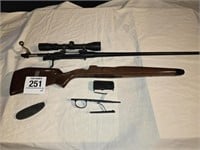 Bolt action rifle w/ stock & pieces - not sure if