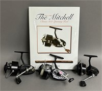 Trio of Mitchell Spinning Reels w/ Book