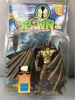 Spawn gold figure in packaging