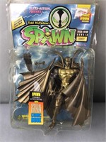 Spawn gold figure toy in packaging