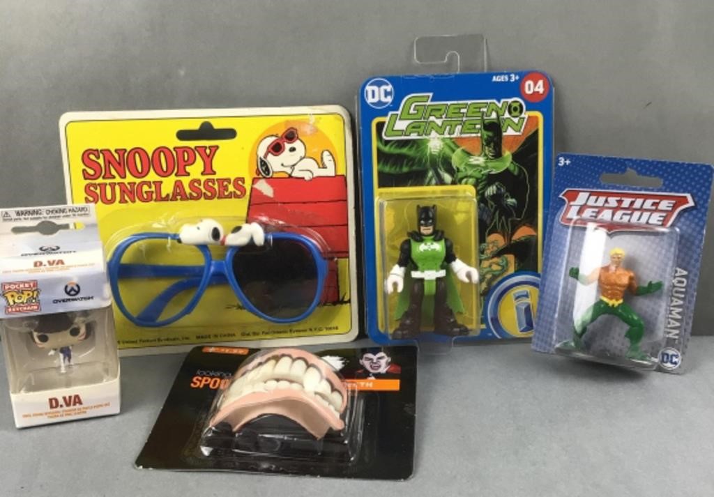 Snoopy glasses, green lantern figure, and other