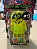 Monster Pooper Glow in Dark Pooping CandyDispenser
