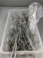 Peg hook pieces in shoe box size container