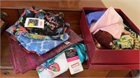 Shoebox filled with silk and cotton scarves