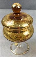 Amber glass pedestal dish with lid and gold lace