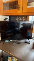 TCL 32 inch flatscreen TV
With the remote