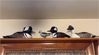 Three painted wood carved duck decoys, and a