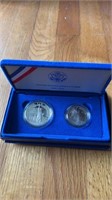 1986 Statue of Liberty collector coins, one is