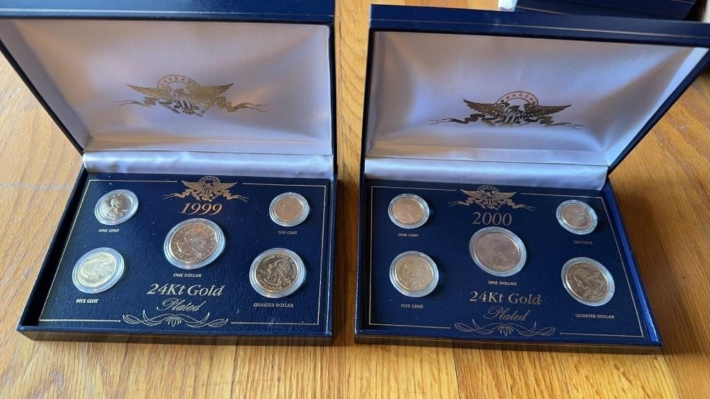 Two boxes of Collecter coins, 24 karat gold
