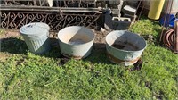Galvanized metal tubs, and trashcan with lid.