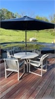 PVC table with four chairs, glider and lounger.