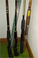 FOUR FISHING RODS AND YARD STICK