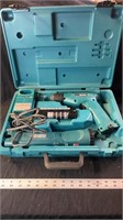 Makita drill, flashlight and charger. Unknown