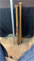2 wooden baseball bats