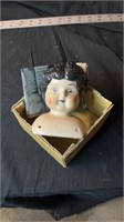 Old fashioned china doll head