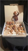Box lot of exotic doll heads
