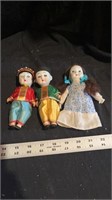 3 oriental porcelain head dolls. 2 squeak