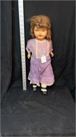 Early 1900s straw stuffed doll