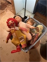 Basket lot of dolls, and Ronald McDonald, missing