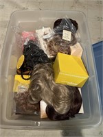 Box lot of doll wigs
