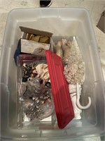 Box of doll parts, eyes, and more