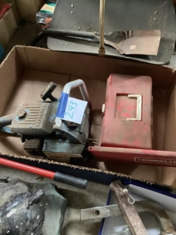 Chainsaw and a small toolbox
