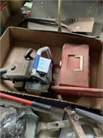 Chainsaw and a small toolbox