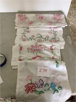 Four hand embroidered table runners
