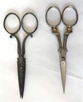Two small 3 1/2" pairs of fancy sewing scissors