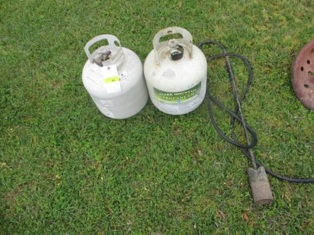 2 propane bottles and torch