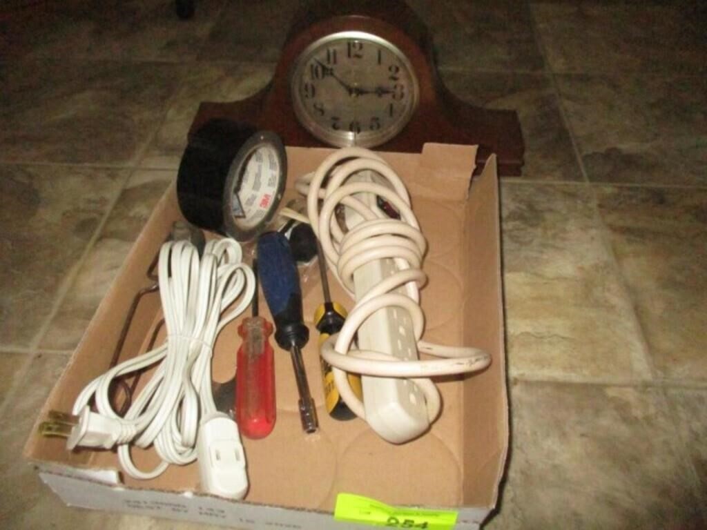 Flat w/electric cords, duct tape, old clock