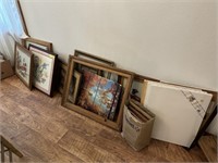 All pictures, frames, canvases on floor
