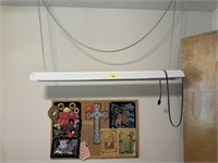 Hanging light and corkboard