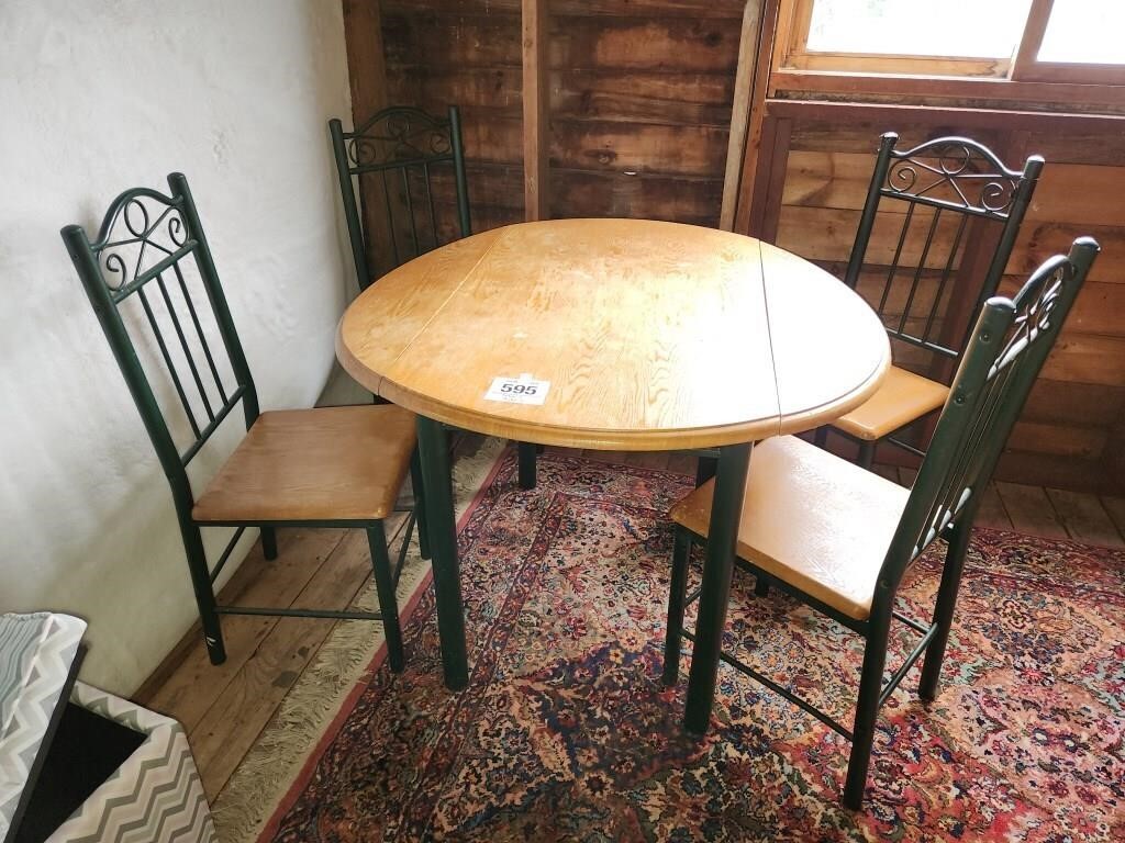 Drop leaf table w/ 4 chairs. Table is 50" x 24" &