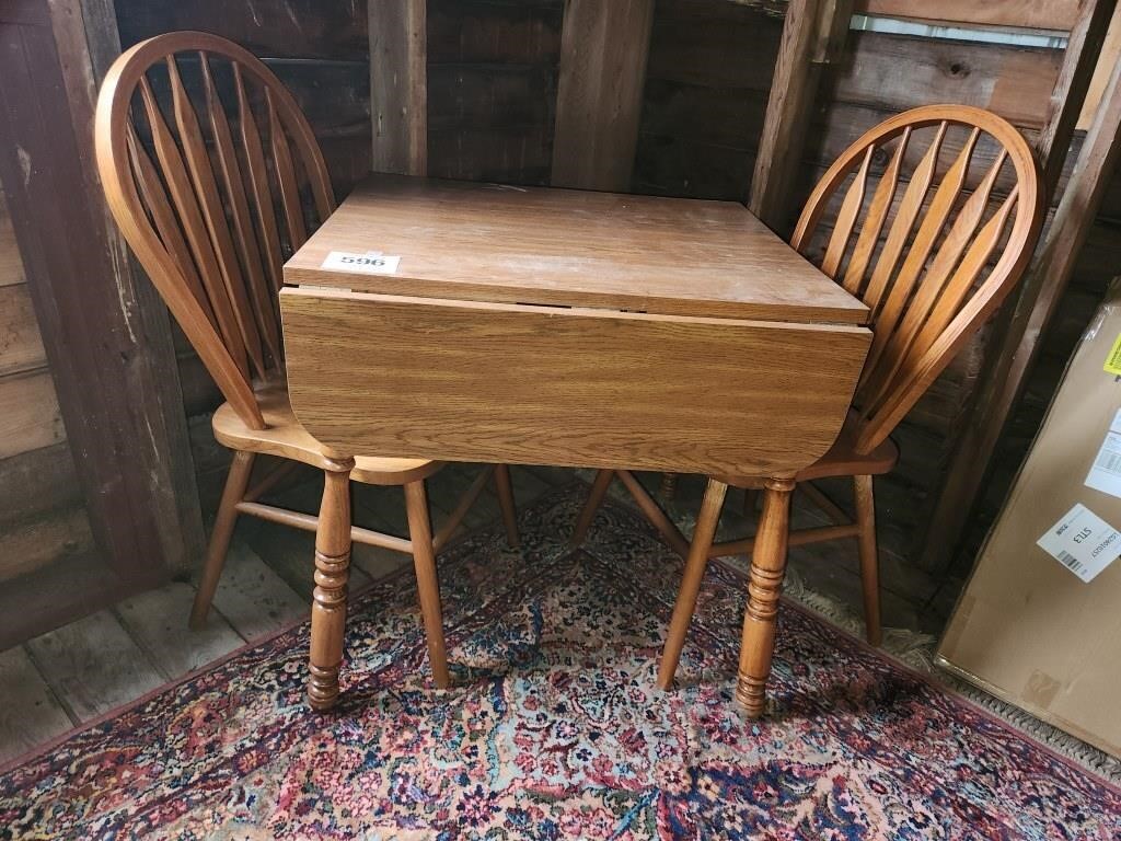 Drop leaf table w/ 2 chairs. Table appr. 25" x 30"