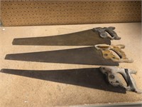 THREE VINTAGE HAND SAWS WITH WOODEN HANDLES