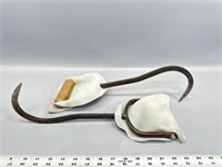 Vintage hay hooks with leather guards