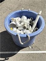 Large tub of PVC pipe fittings