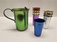 MID CENTURY COLORED ALUMINUM PITCHER AND CUPS