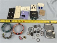 Bracelets, Rings, Earrings in a Metal Pail