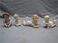 4 Small Vintage Assorted Bisque Piano Babies