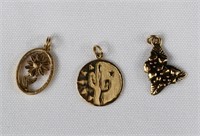 3- 14kt Gold Charms 6.4 Grams