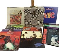 Vinyl LP case with dividers.  Assorted records.